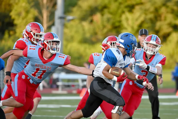 Heights opens season with solid all-around win